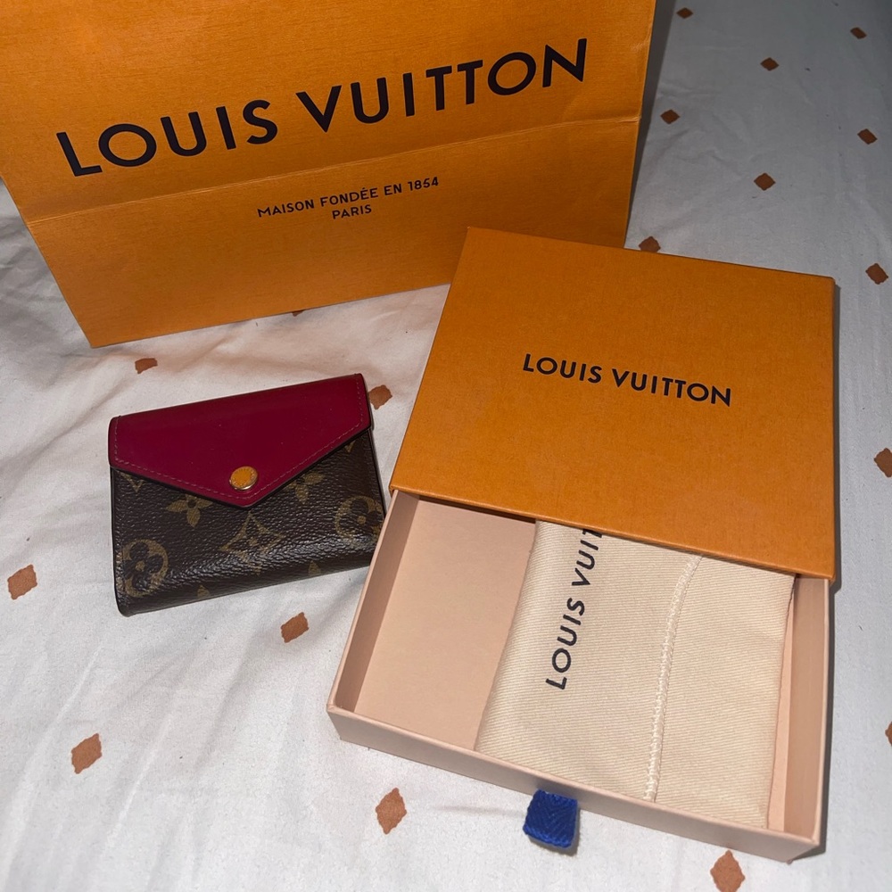 Louis Vuitton Zoe wallet monogram in fuchsia